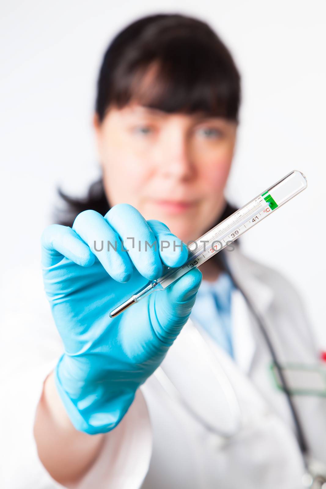 doctor nurse holding thermometer, isolated on white