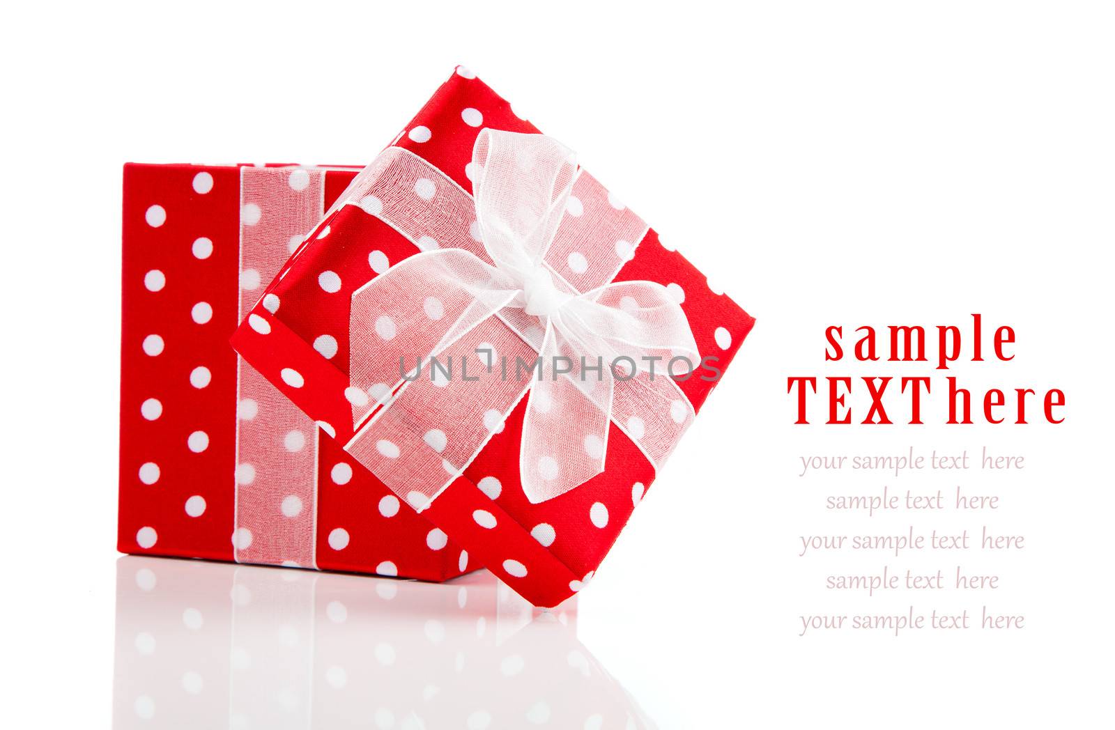 red gift box with  bow on white background