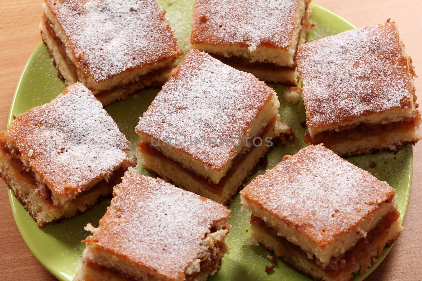 sweet apple cakes on plate by goce