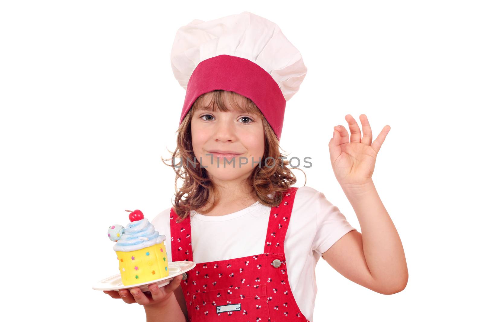 little girl cook with cupcake and ok hand sign