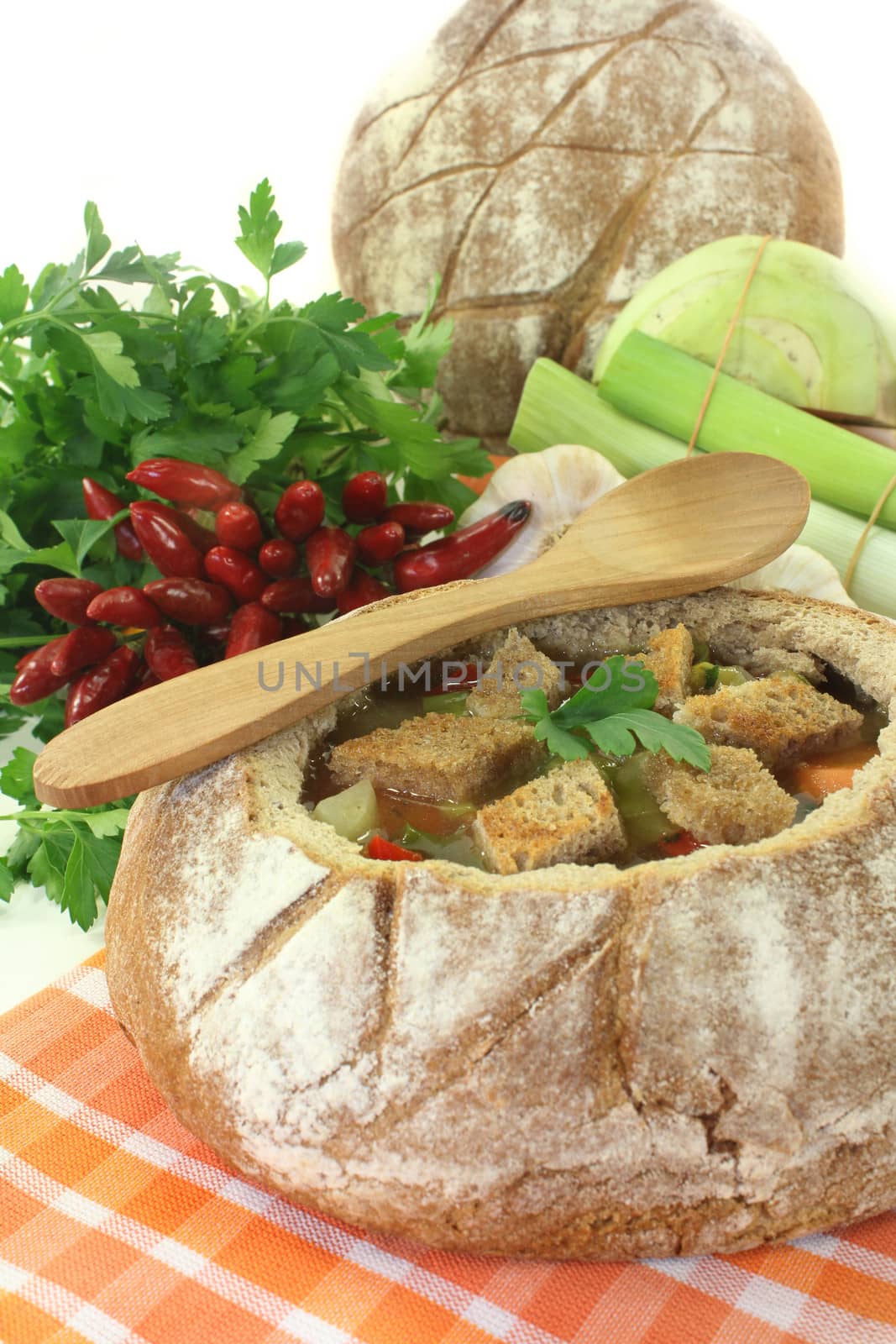 a farmhouse bread stuffed with a colorful bread soup