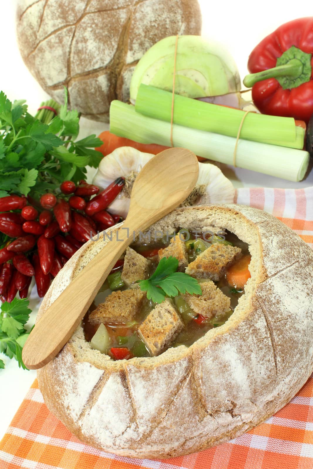 a farmhouse bread stuffed with a colorful bread soup