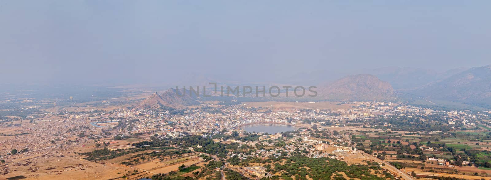 Panorama Holy city Pushkar and Puchkar Mela (camel fair) aerial view from Savitri temple. Rajasthan, India