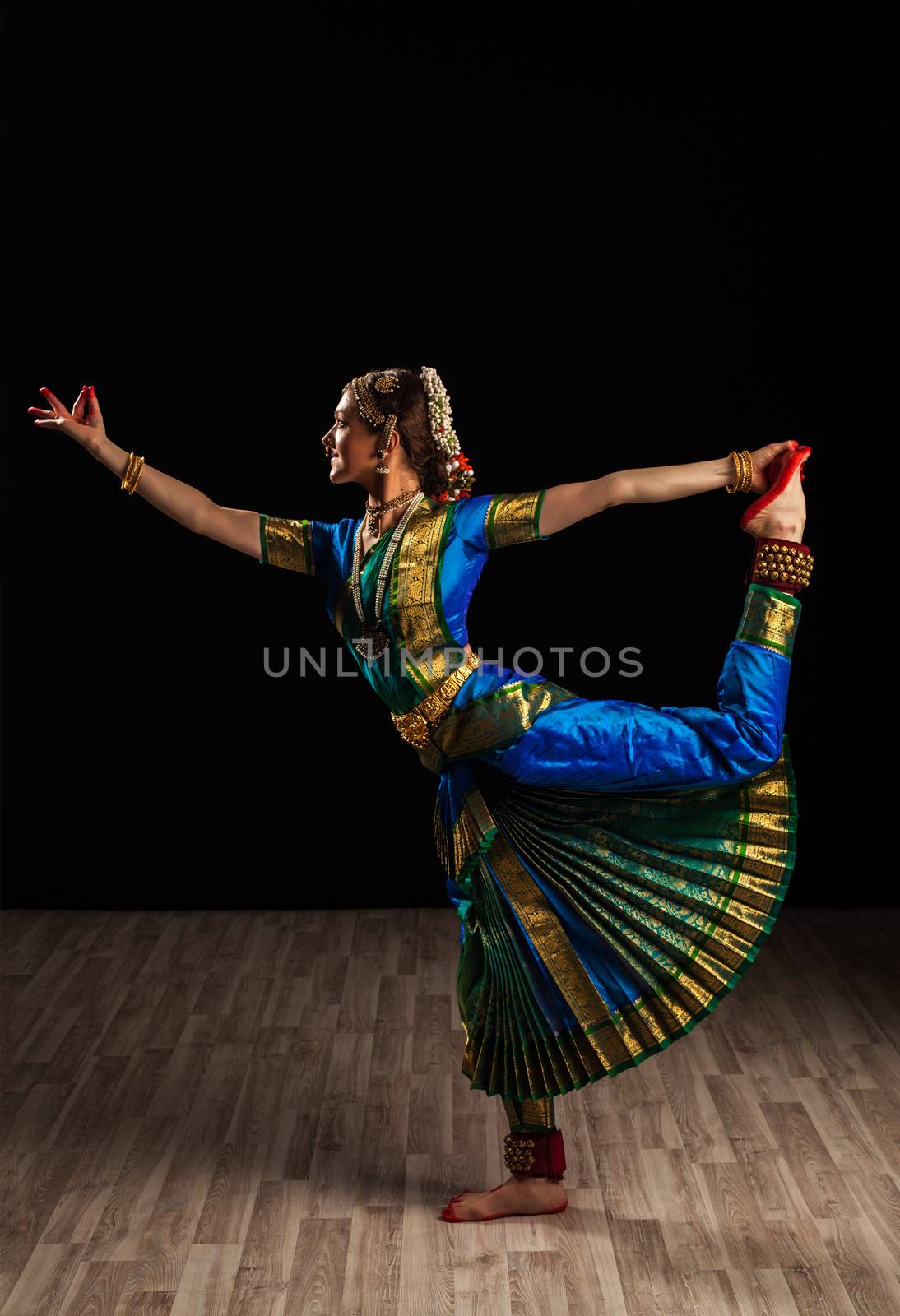 Young beautiful woman dancer exponent of Indian classical dance Bharatanatyam