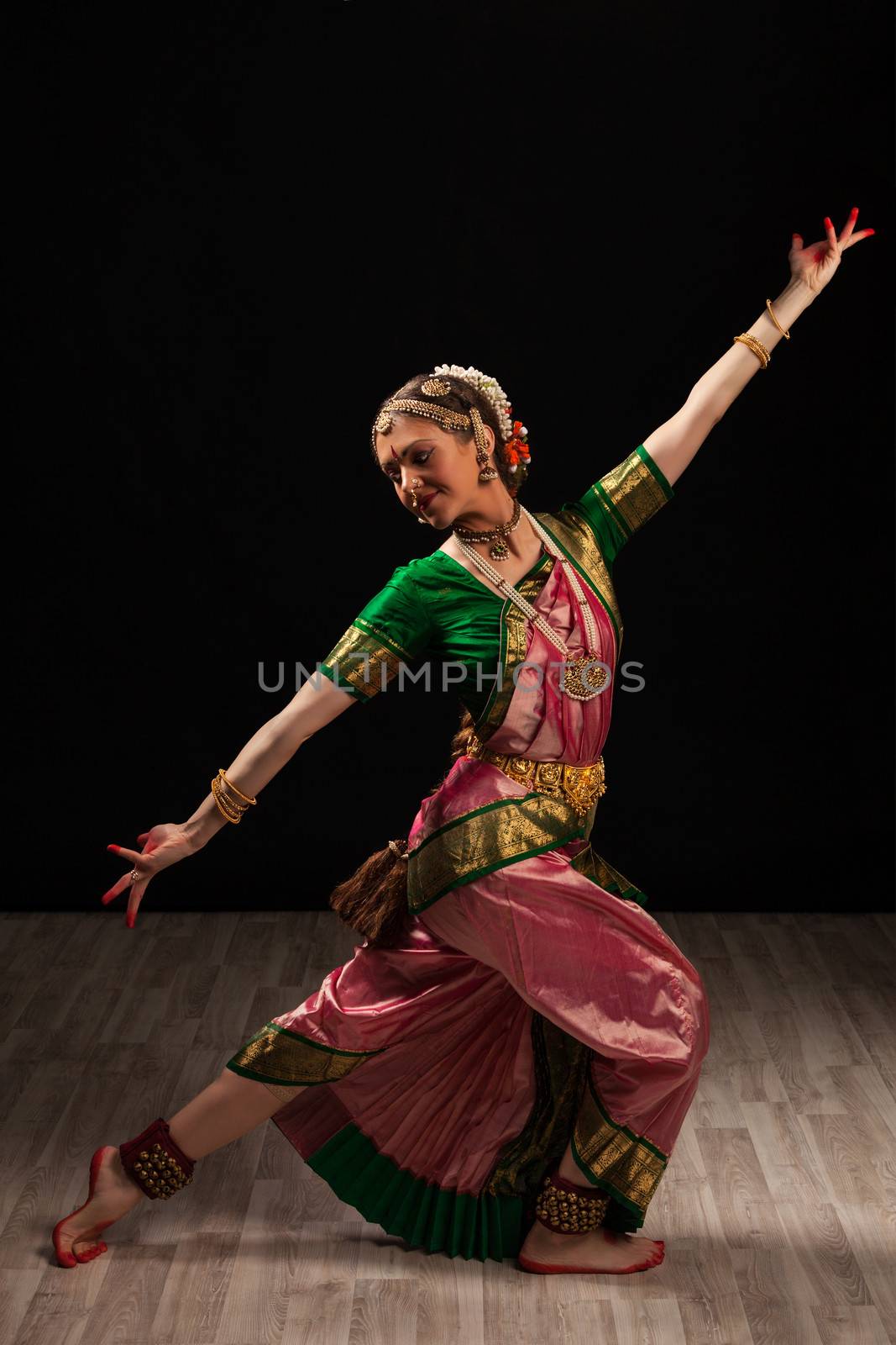 Young beautiful woman dancer exponent of Indian classical dance Bharatanatyam