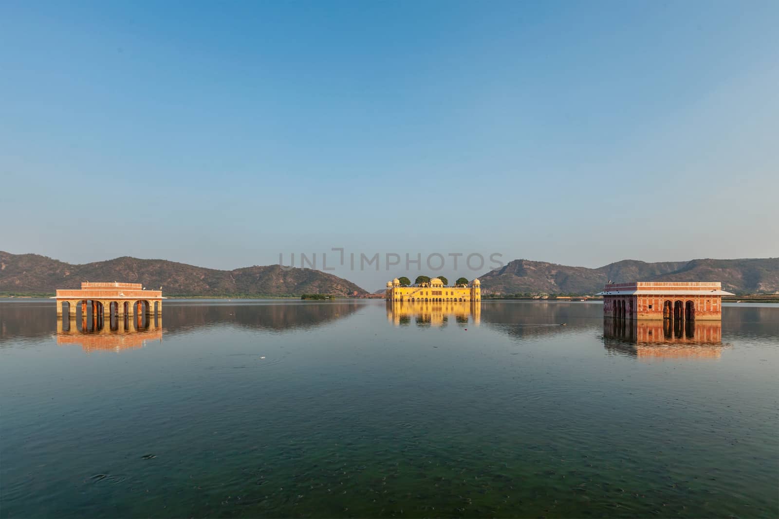 Rajasthan landmark - Jal Mahal (Water Palace) on Man Sagar Lake on sunset.  Jaipur, Rajasthan, India