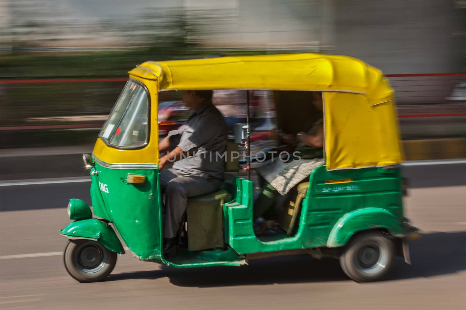 Indian auto (autorickshaw) in the street. Delhi, India  by dimol