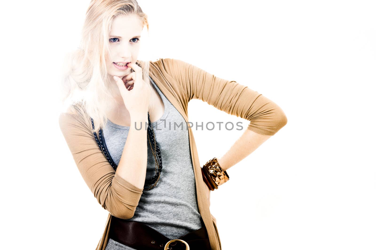 Beautiful fashion woman posing over a white background