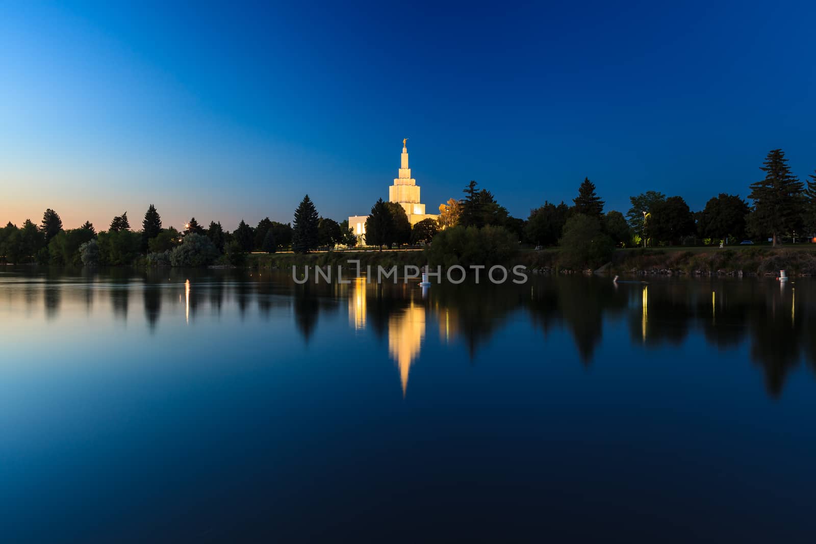 Idaho Falls, US - JUNE 30, 2012: The gleaming Mormon Temple serves as a centerpiece to the city, standing on the banks of the Snake River.
