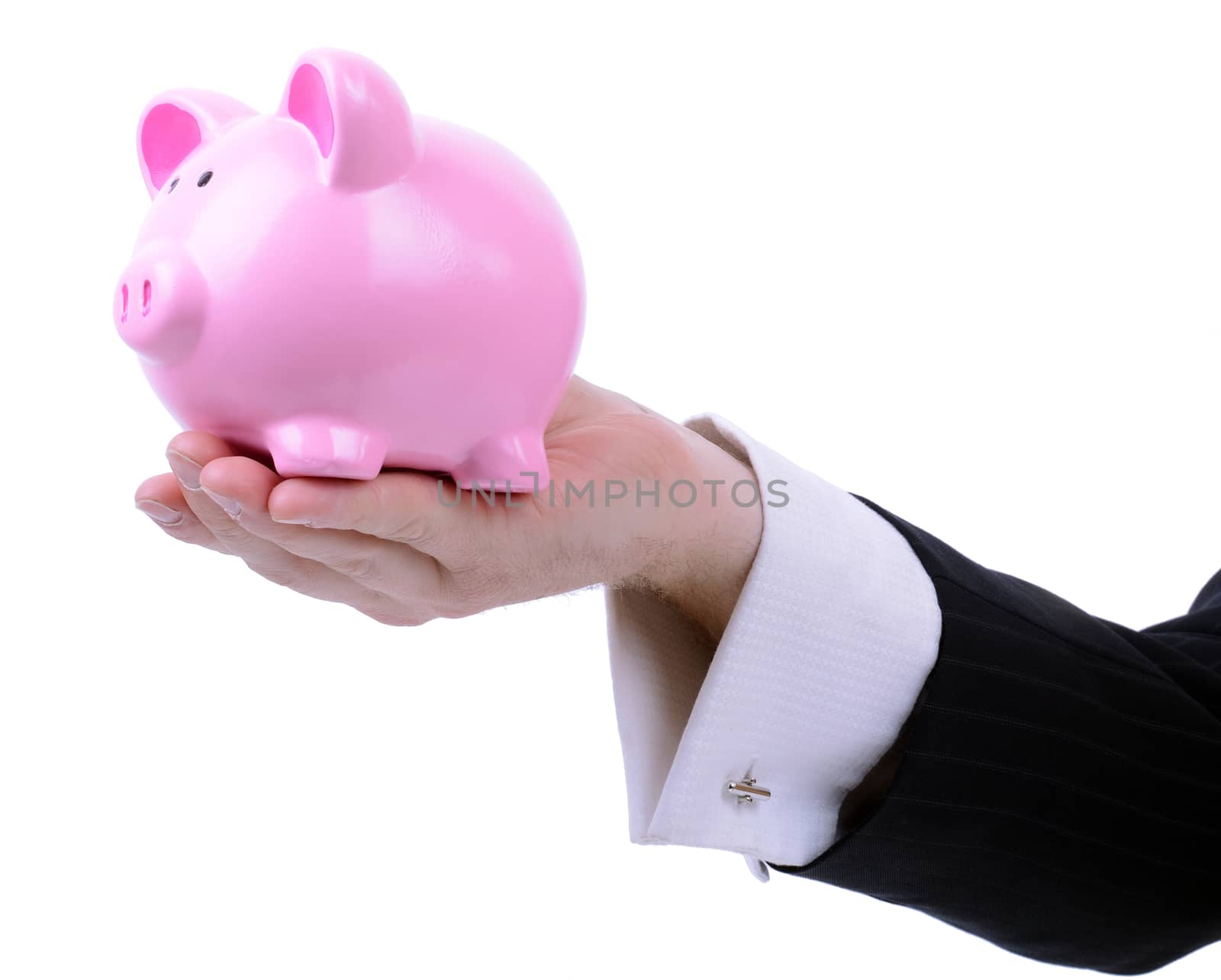 businessman holding out a piggy bank isolated on white background