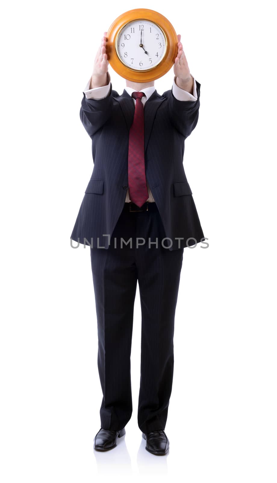 businessman holding clock displaying 5 o'clock isolated on white