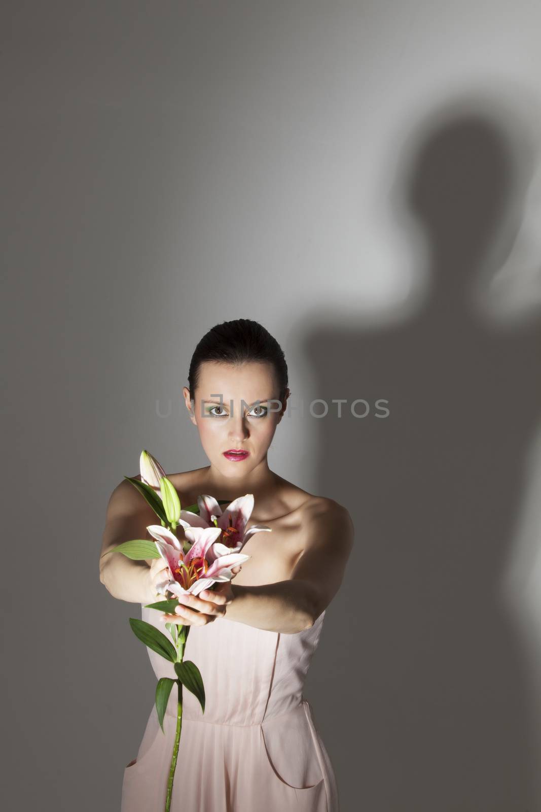 woman with a lily flower by bernjuer