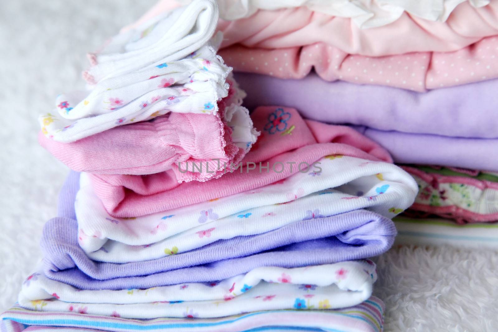 Lot of different baby clothes for the newborn