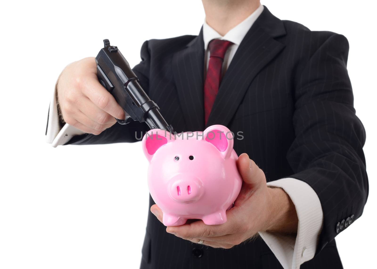 buisnessman holding bank to ransum with a gun isolated on a white background