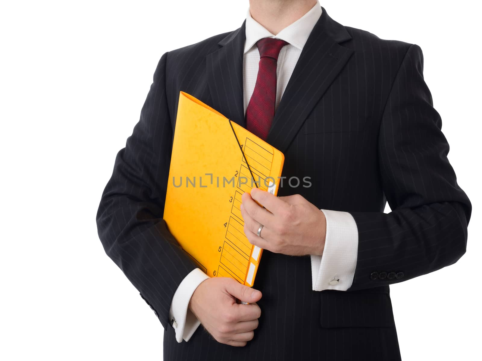 A businessman holding on a folder isolated on white