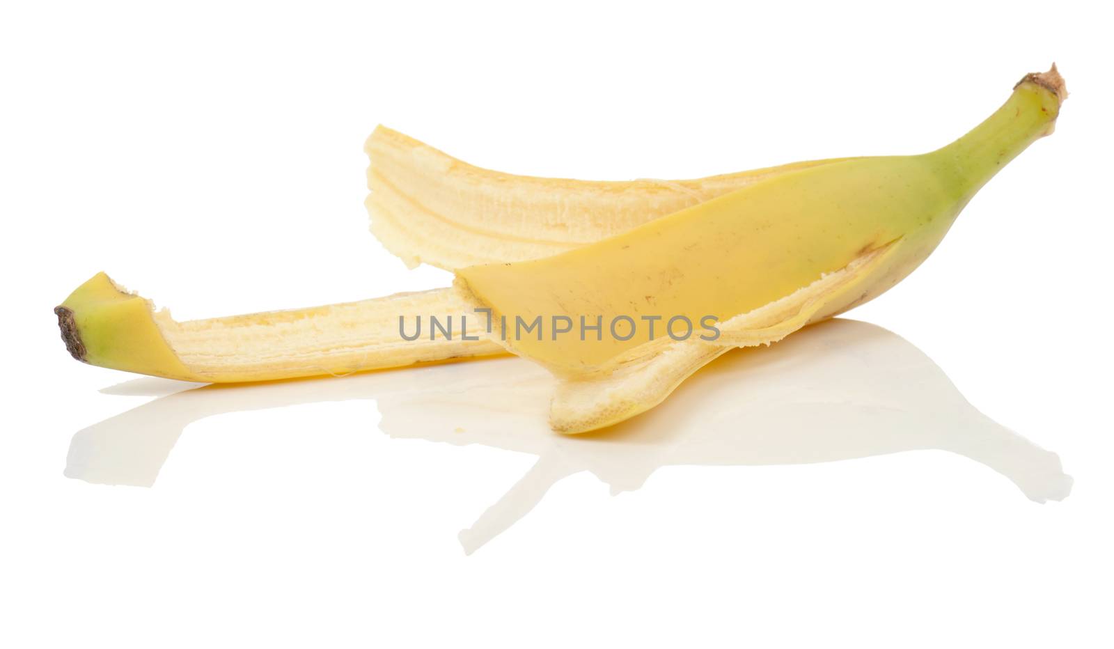 an eaten banana with peel left on a isolated white background