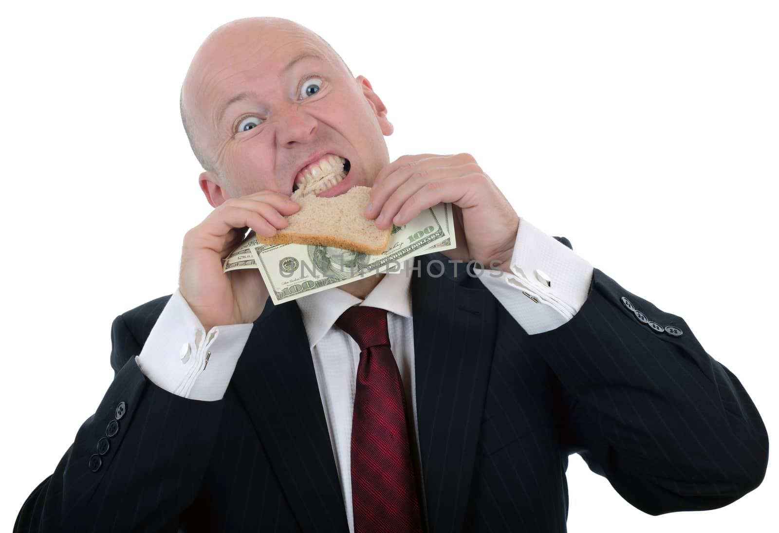 businessman eating a money sandwich  isolate don a white background