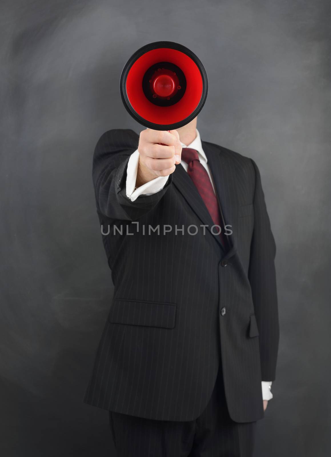 businessman using a megaphone to broadcast news