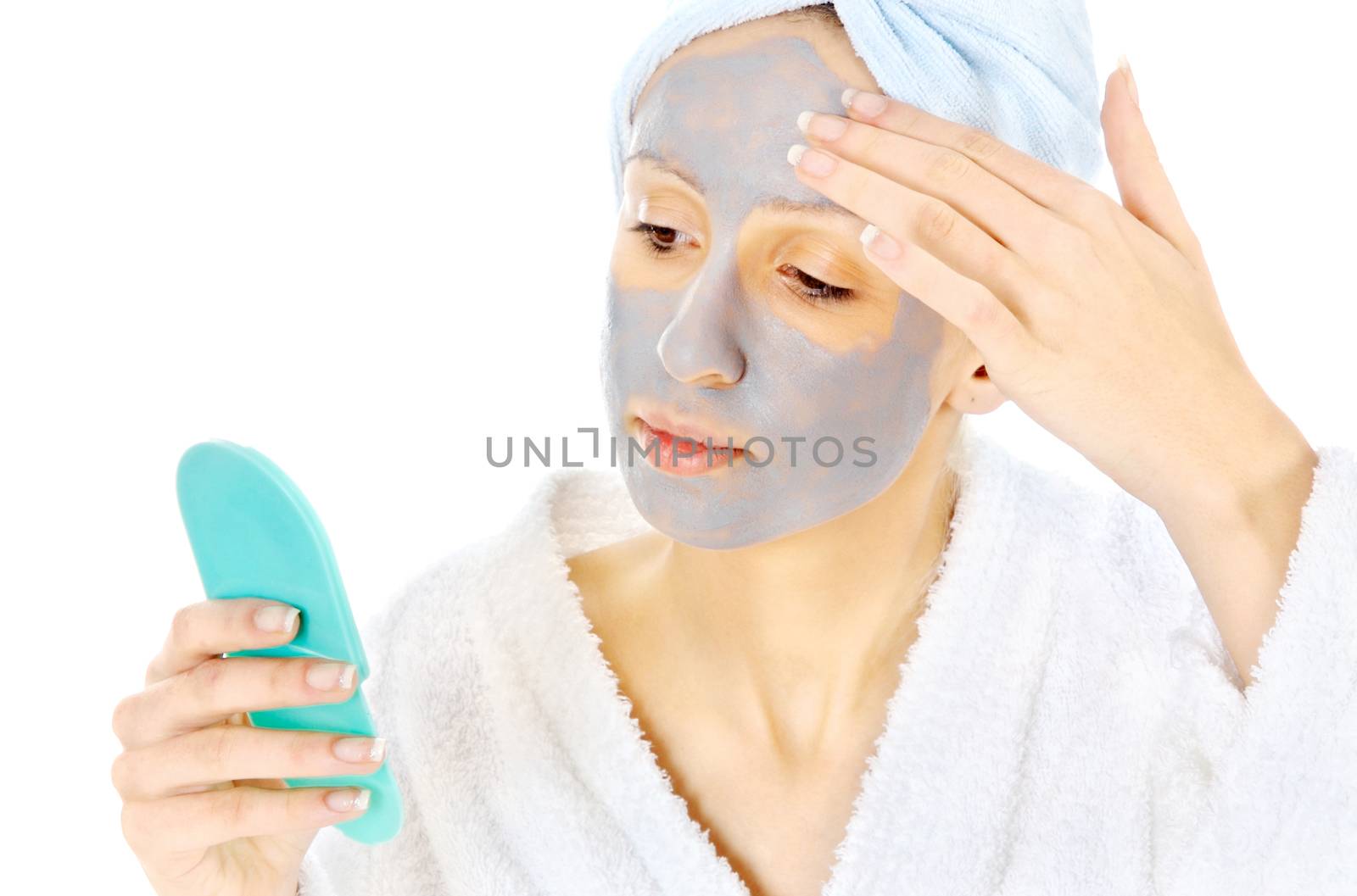 Young woman taking care of her skin