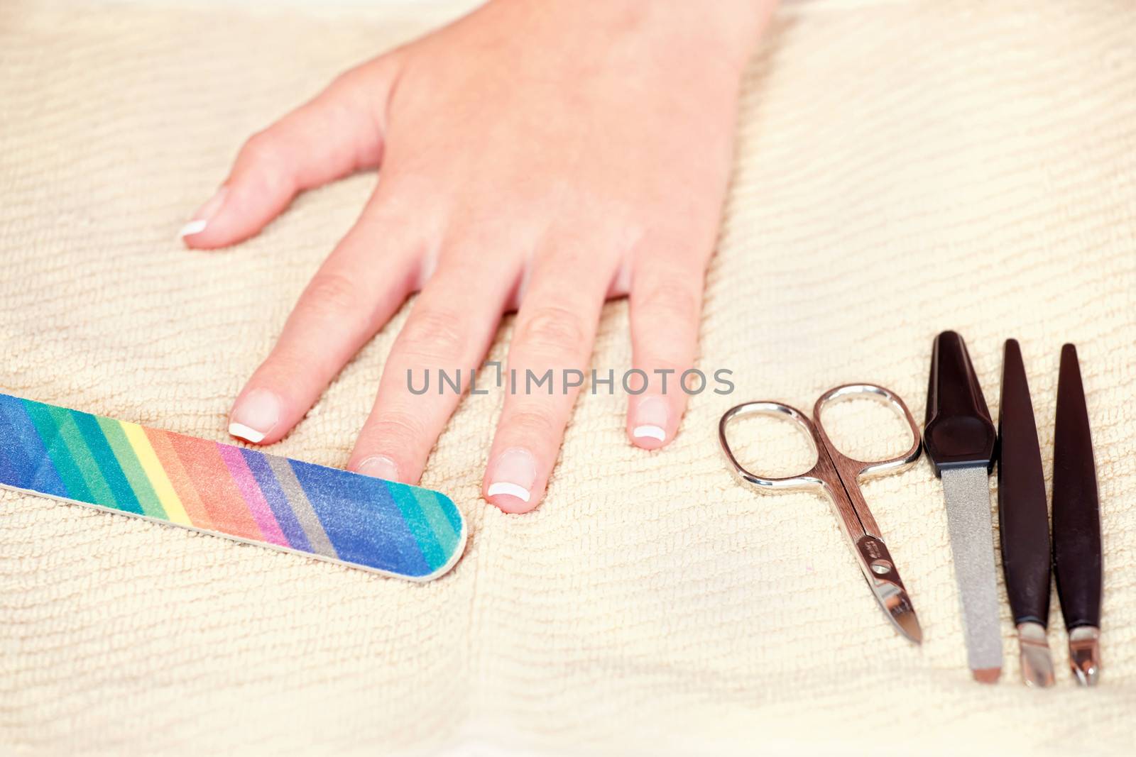 Nails beauty treatment with nail file