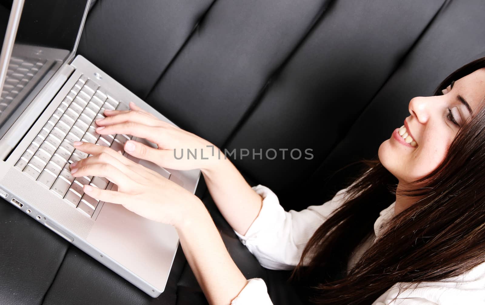 Young Hispanic Woman surfing on the Sofa	 by Spectral