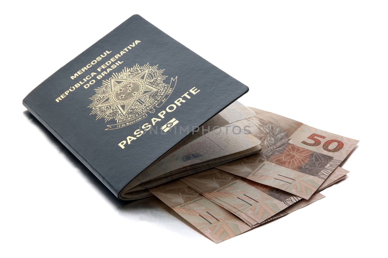 Brazilian passport and brazilian currency (Real) by rodrigobellizzi