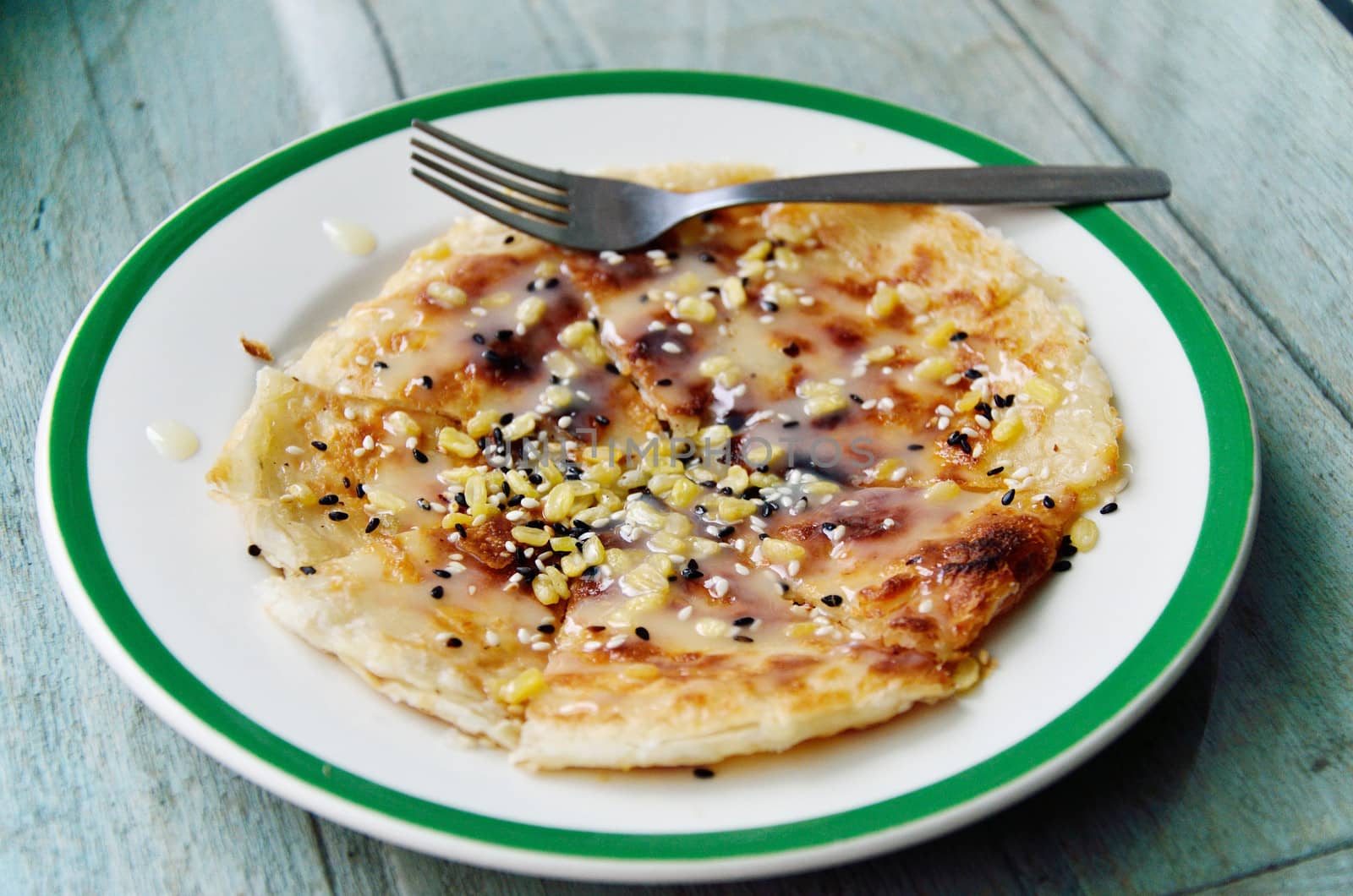 Southern flat bread with sweetened condensed milk and seasame 