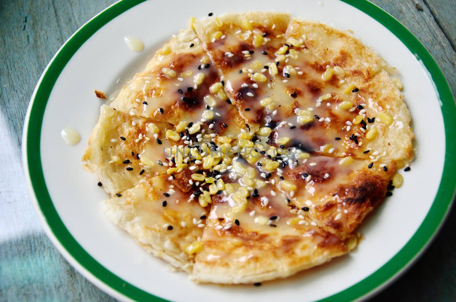 Southern flat bread with sweetened condensed milk and seasame 