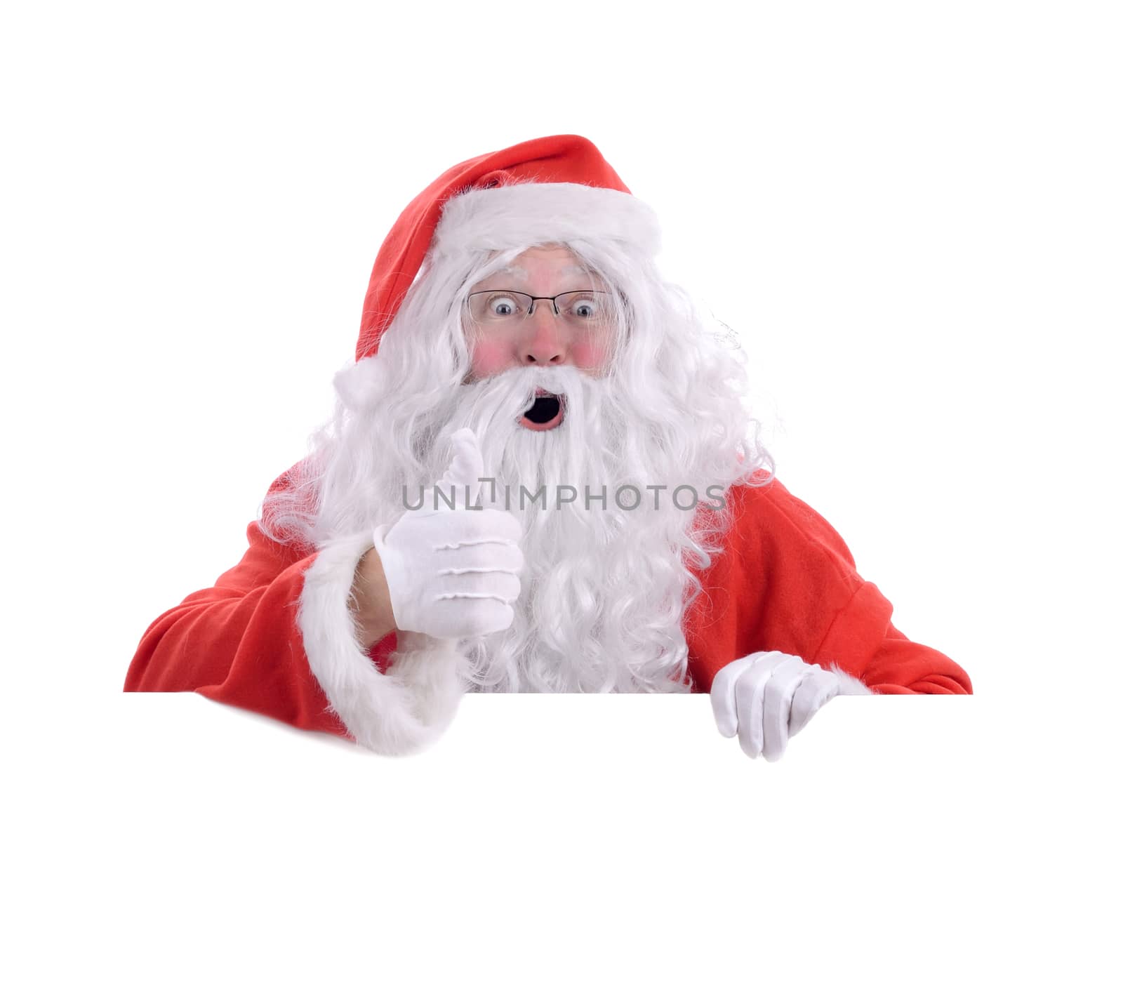 Santa poping up behind white copy space with a thumbs up you have been good, isolated on a white background