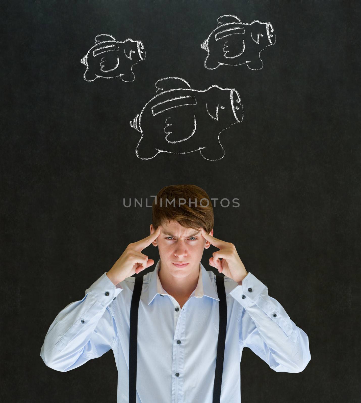 Thinking businessman with flying money piggy banks in chalk on blackboard background
