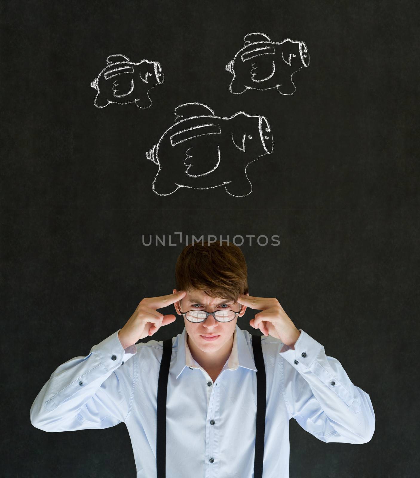 Thinking businessman with flying money piggy banks in chalk on blackboard background by alistaircotton