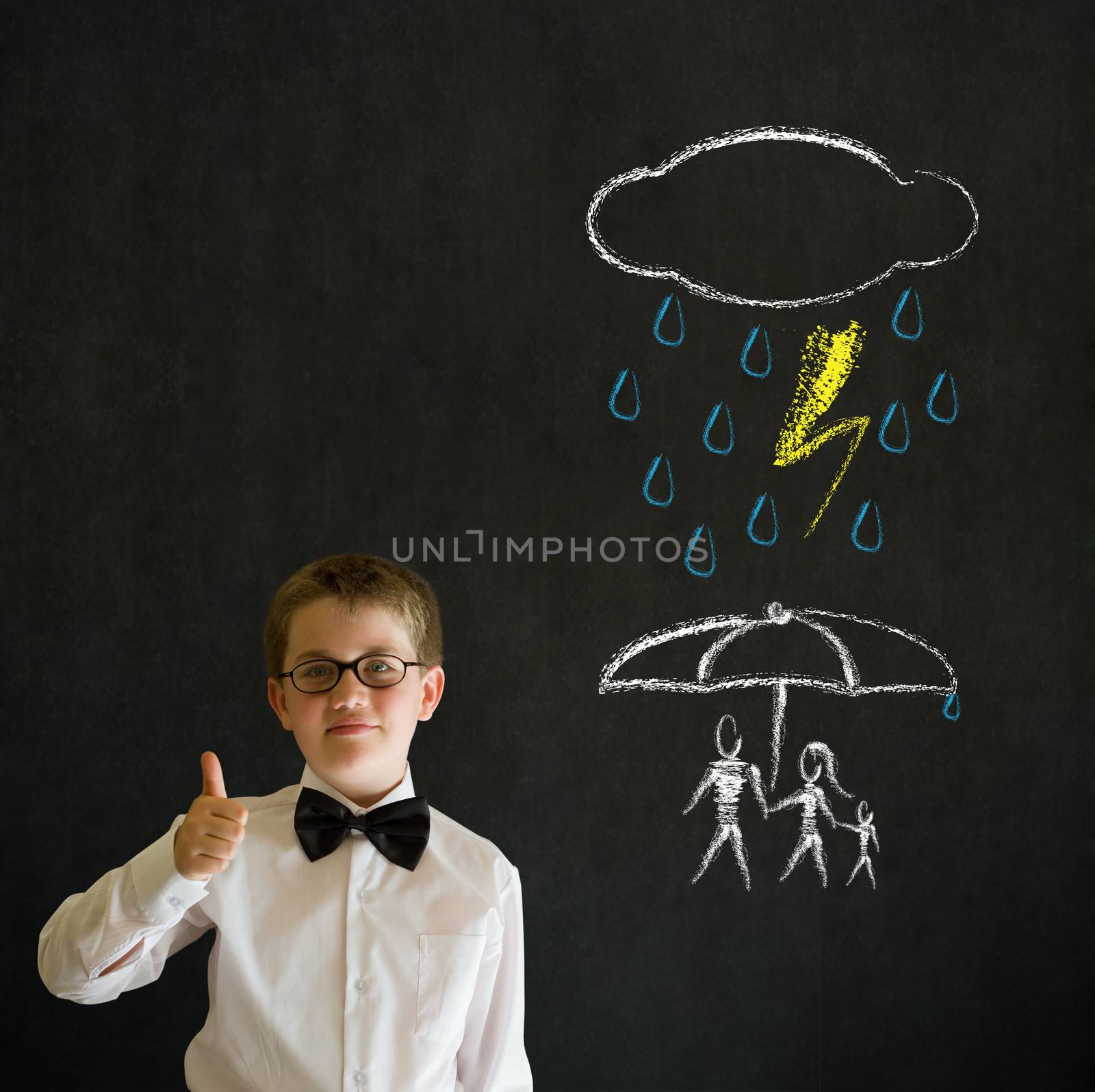 Thinking boy business man thinking about protecting family from natural disaster on blackboard background by alistaircotton