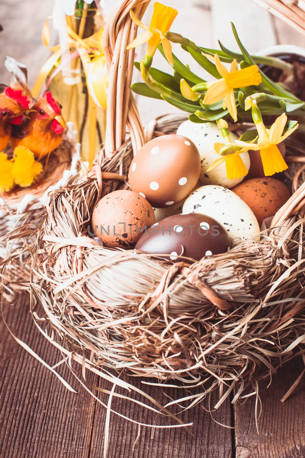Brown and yellow eggs in basket, Easter decorations