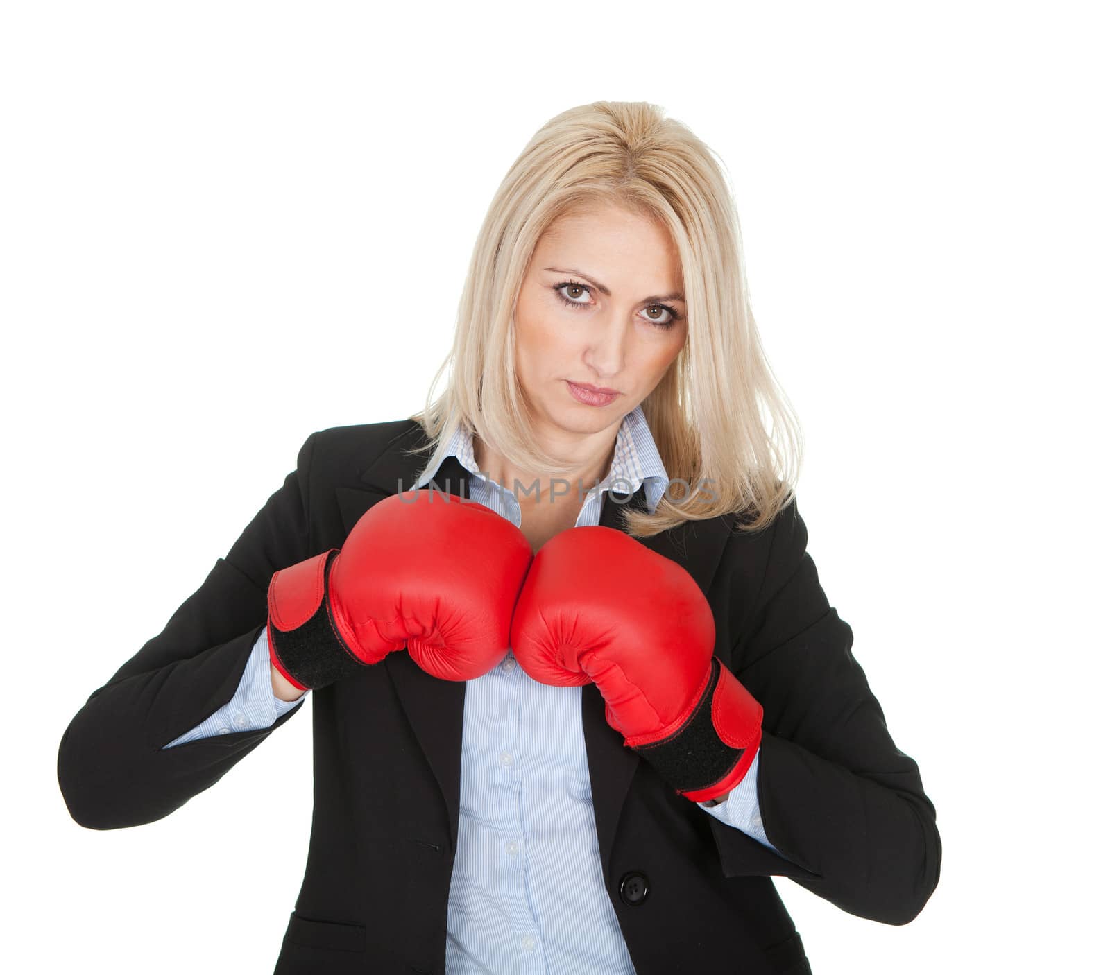 Beautiful businesswomen posing with boxing gloves by AndreyPopov