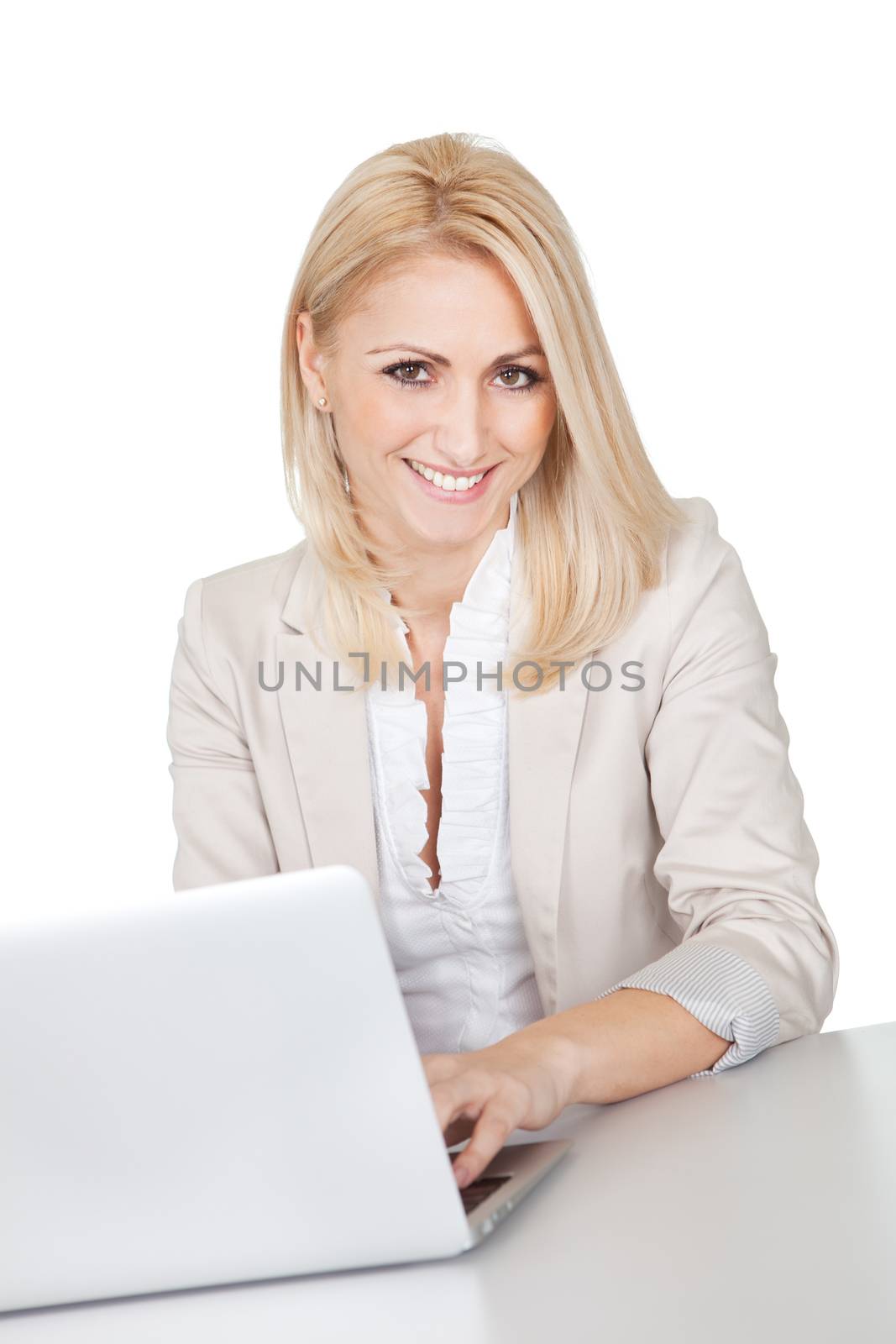 Beautiful businesswoman working on computer in the office