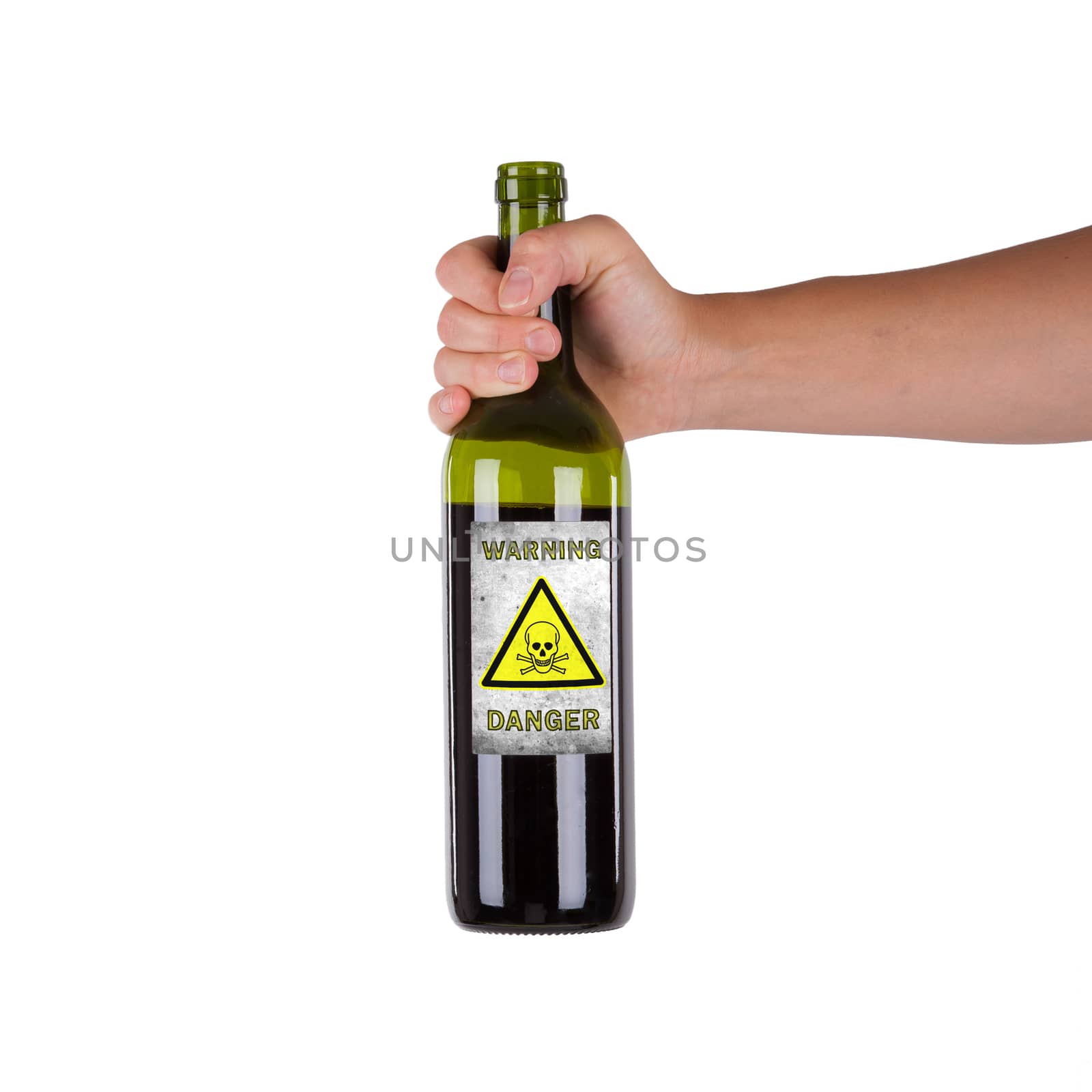 Hand holding a bottle with a warning, poison