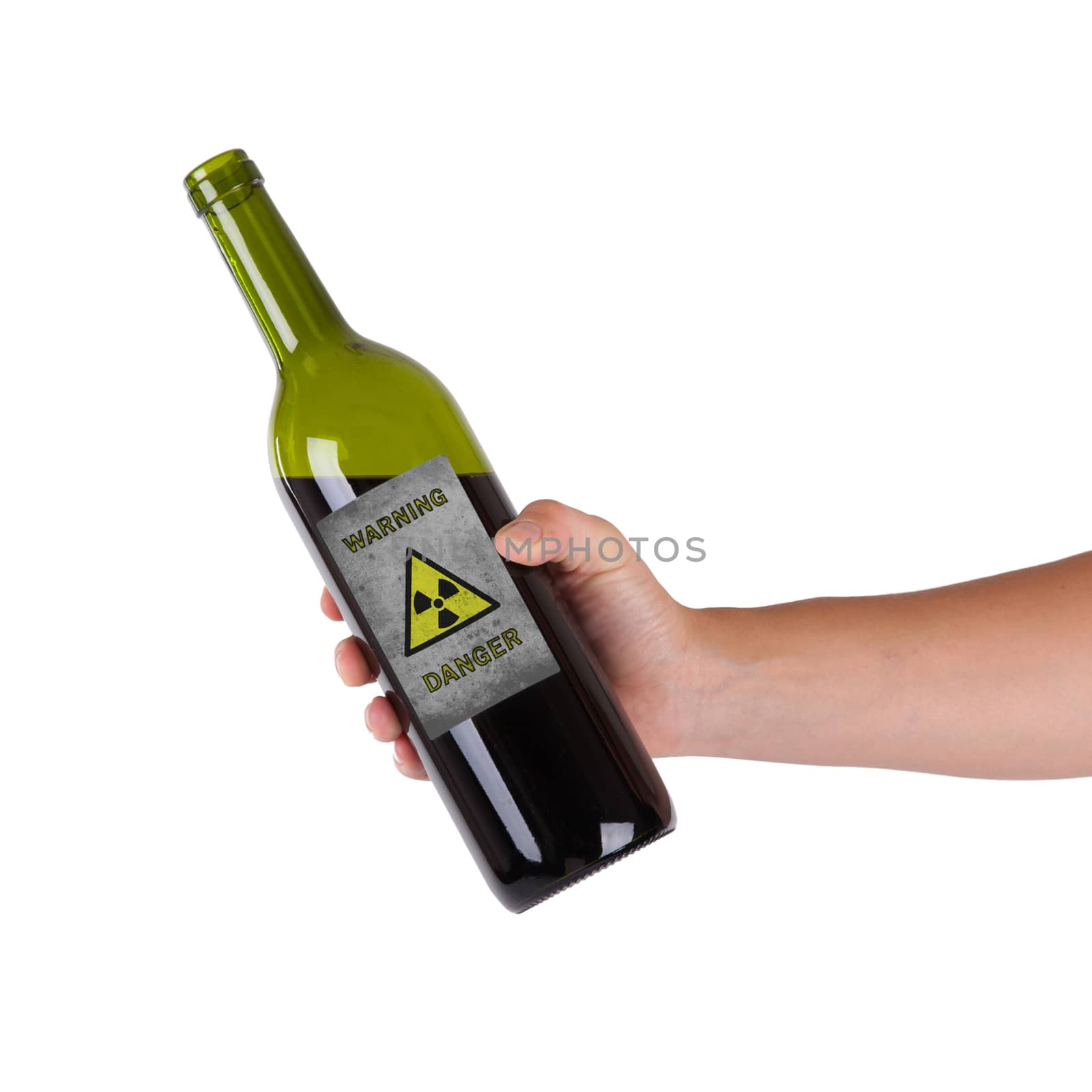 Hand holding a bottle with a warning, radioactive