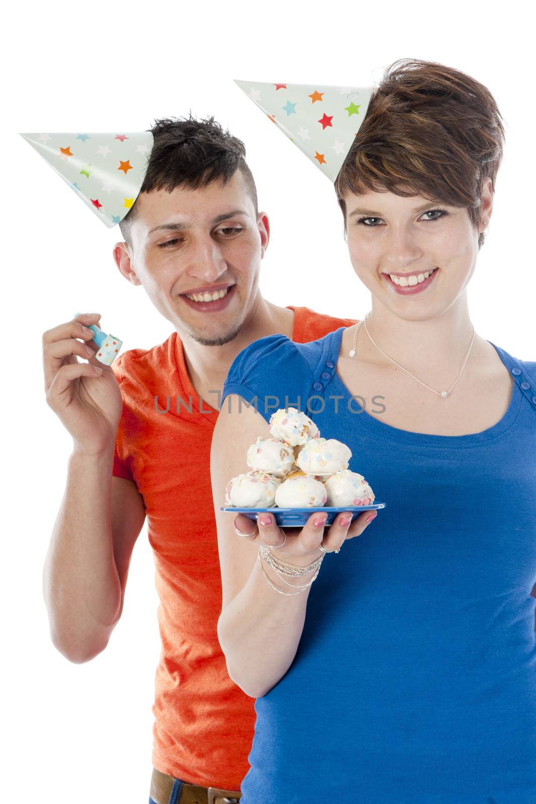 A boy and a girl, ready to celebrate a birthday