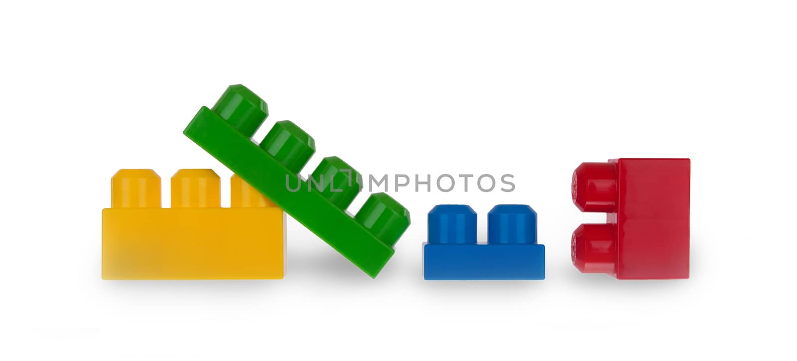 Colorful plastic bricks isolated on white background