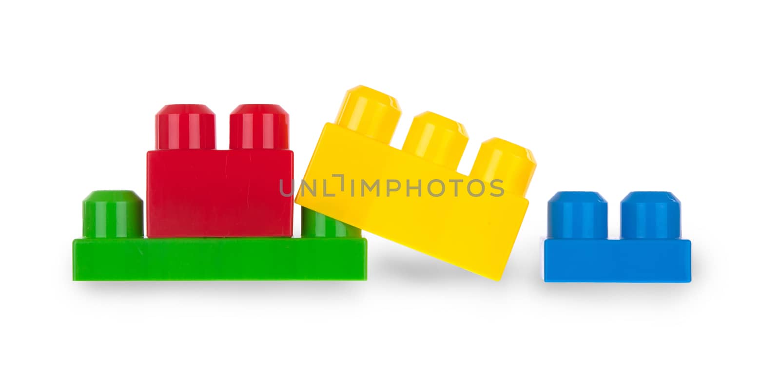 Colorful plastic bricks isolated on white background