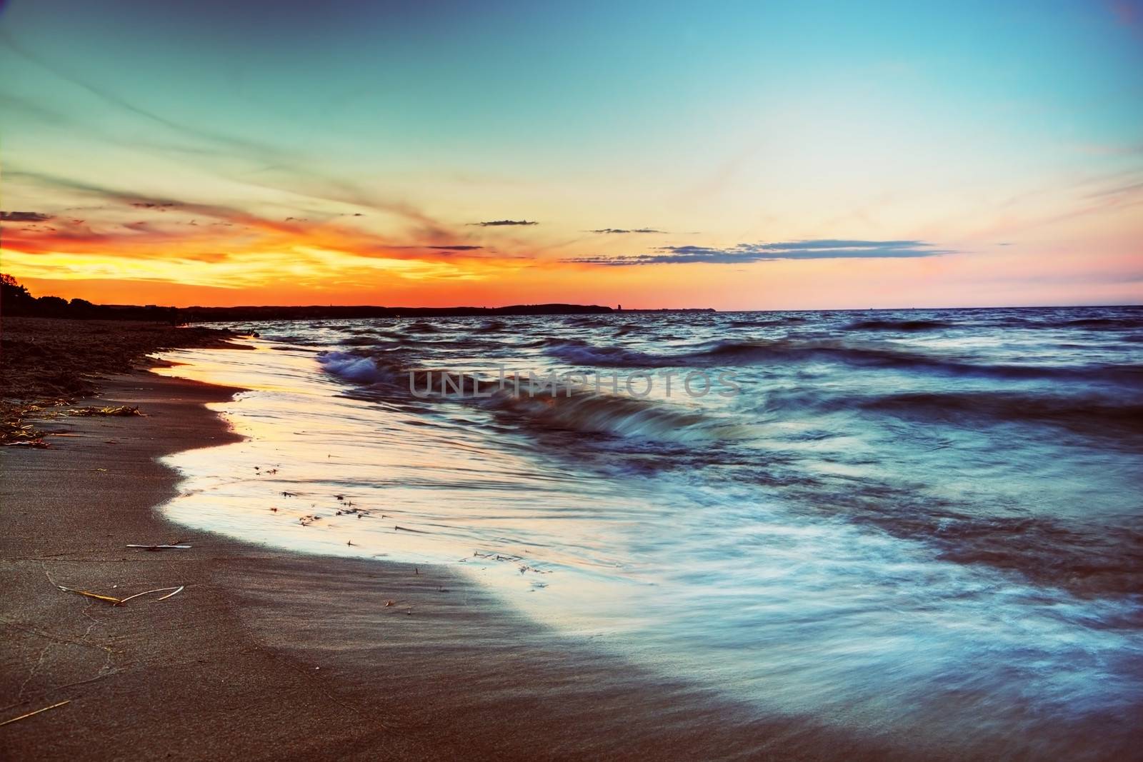 Ocean at sunset. Romantic colors