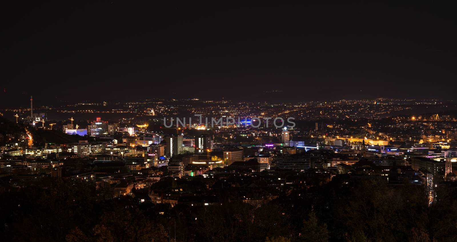 STUTTGART, GERMANY - NOVEMBER 9, 2013: Stuttgart panorama at night as seen from the western areas of the city on November 9, 2013 in Stuttgart, Germany. The Wilhelm-Charlotten platform was renovated in 2012 and offers a great view over the city by day and especially by night.