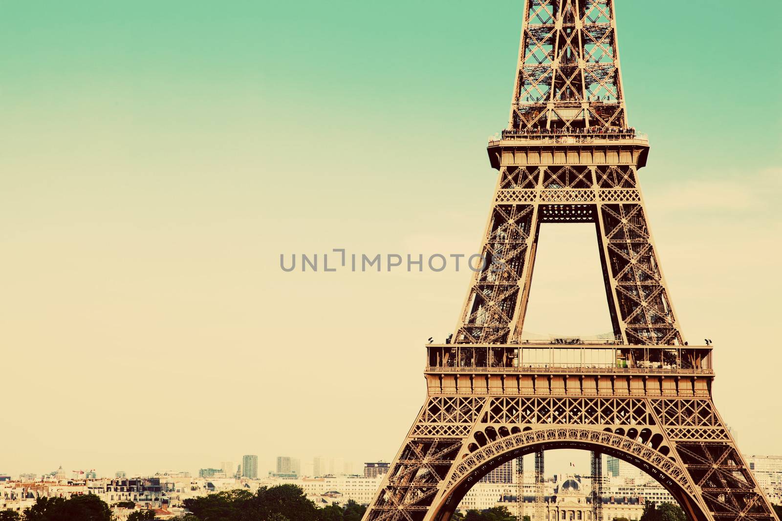 Eiffel Tower middle section, the city in the background, Paris, France. Vintage, retro style