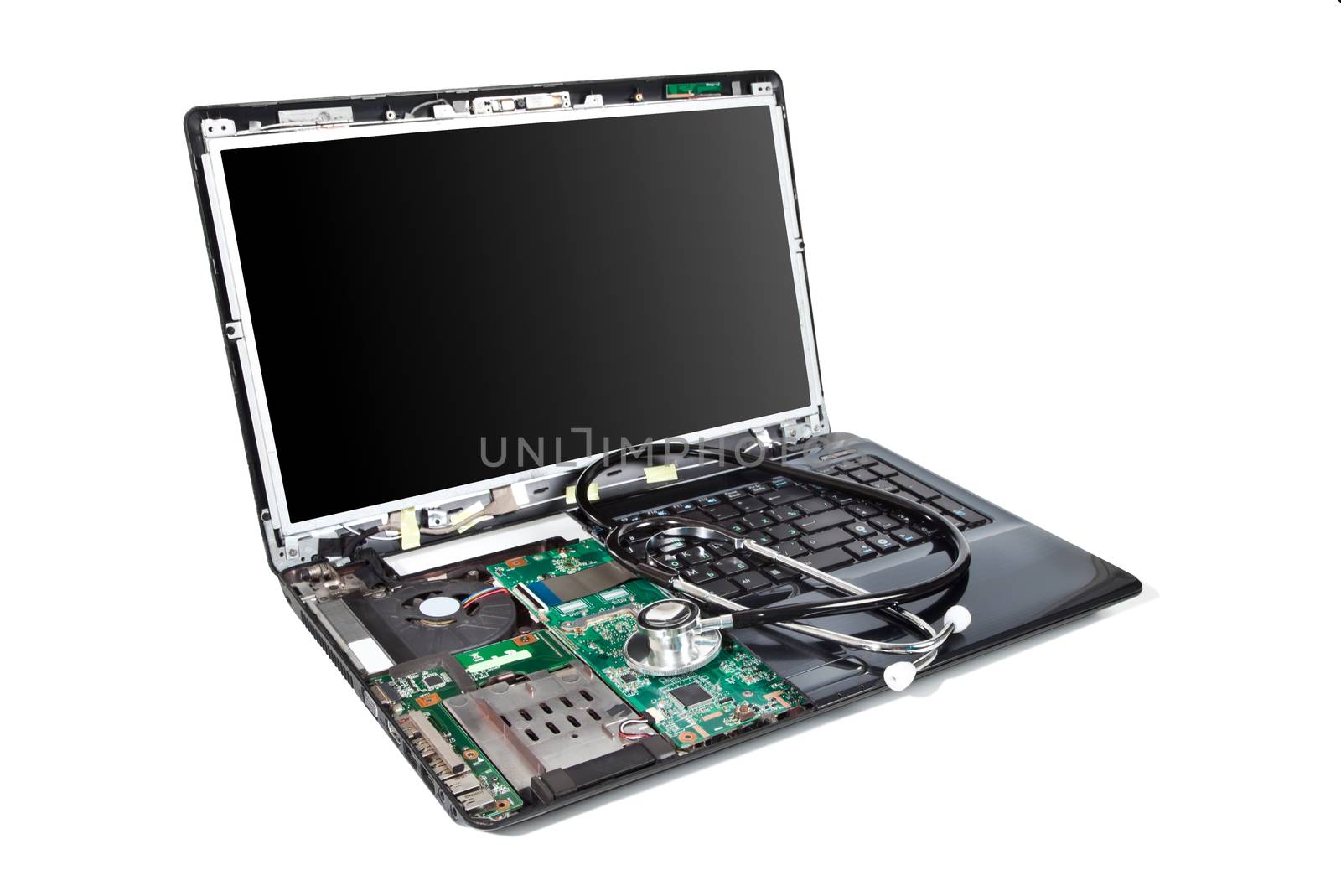 Laptop half disassembled with stethoscope on it by RawGroup