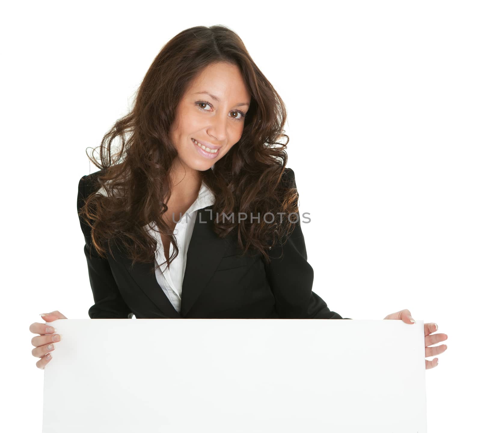 Cheerful businesswomen presenting empty board. Isolated on white