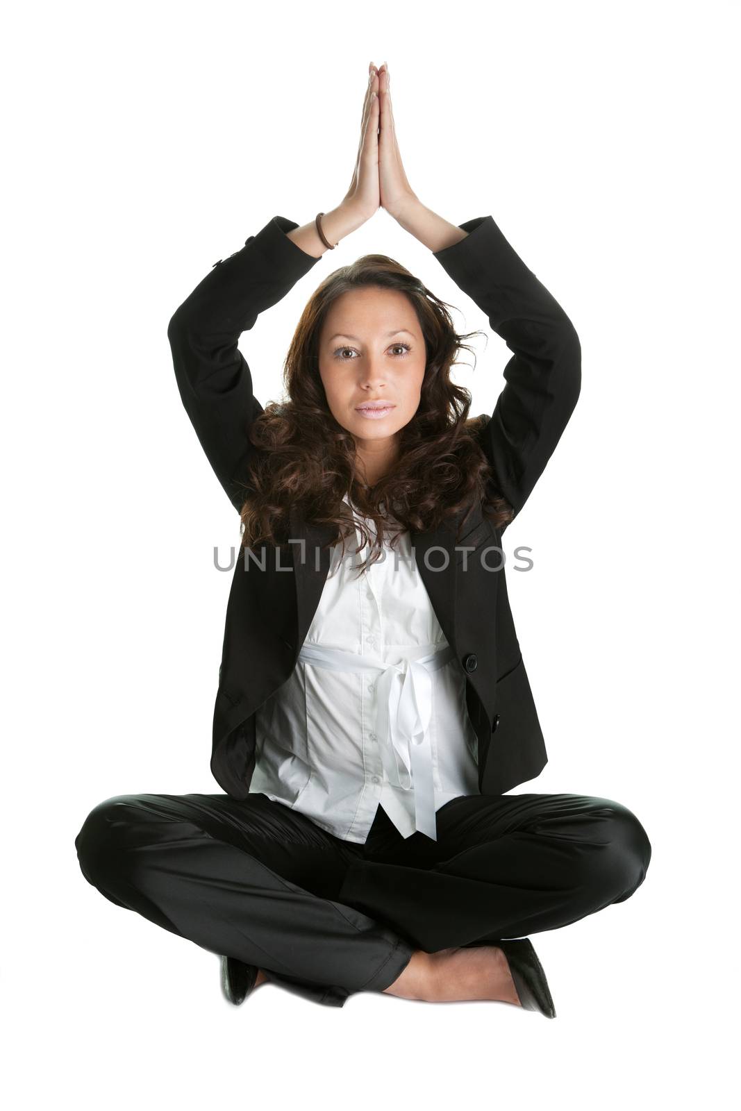 Businesswoman sitting in lotus flower position of yoga. Isolated on white