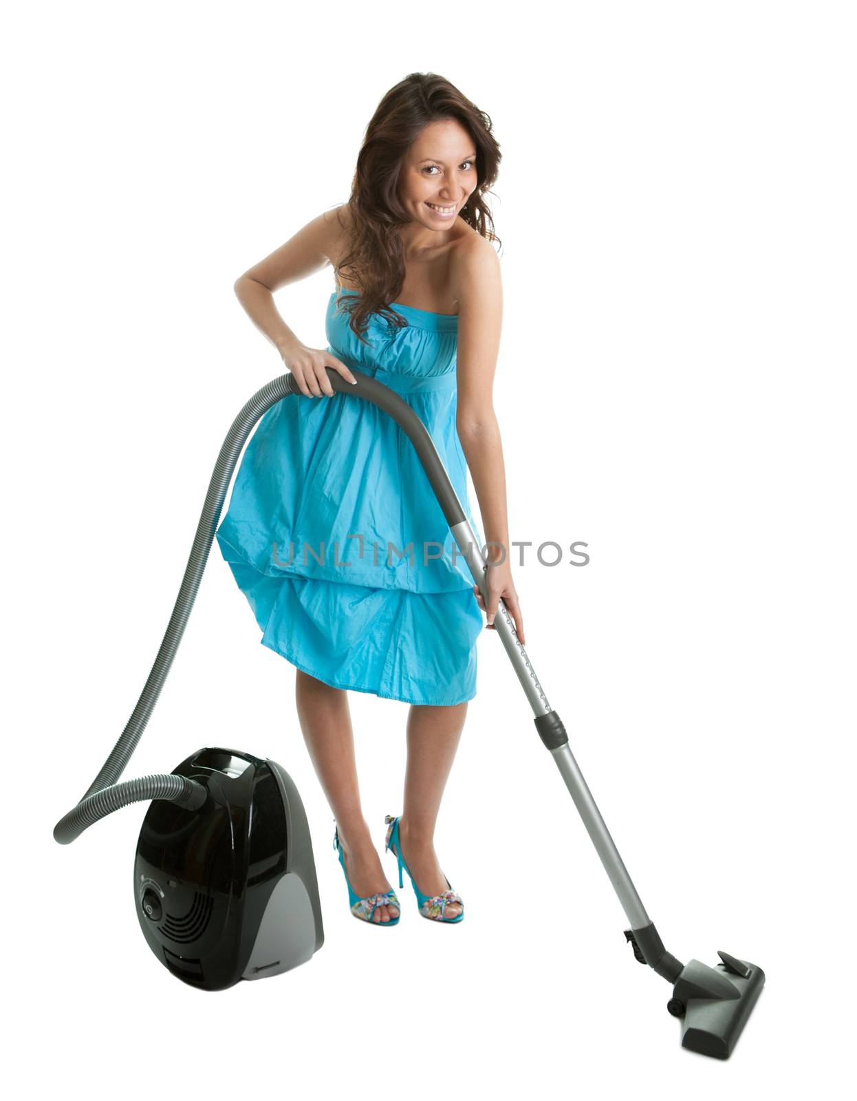 Cheerful woman with handheld vacuum cleaner. Isolated on white