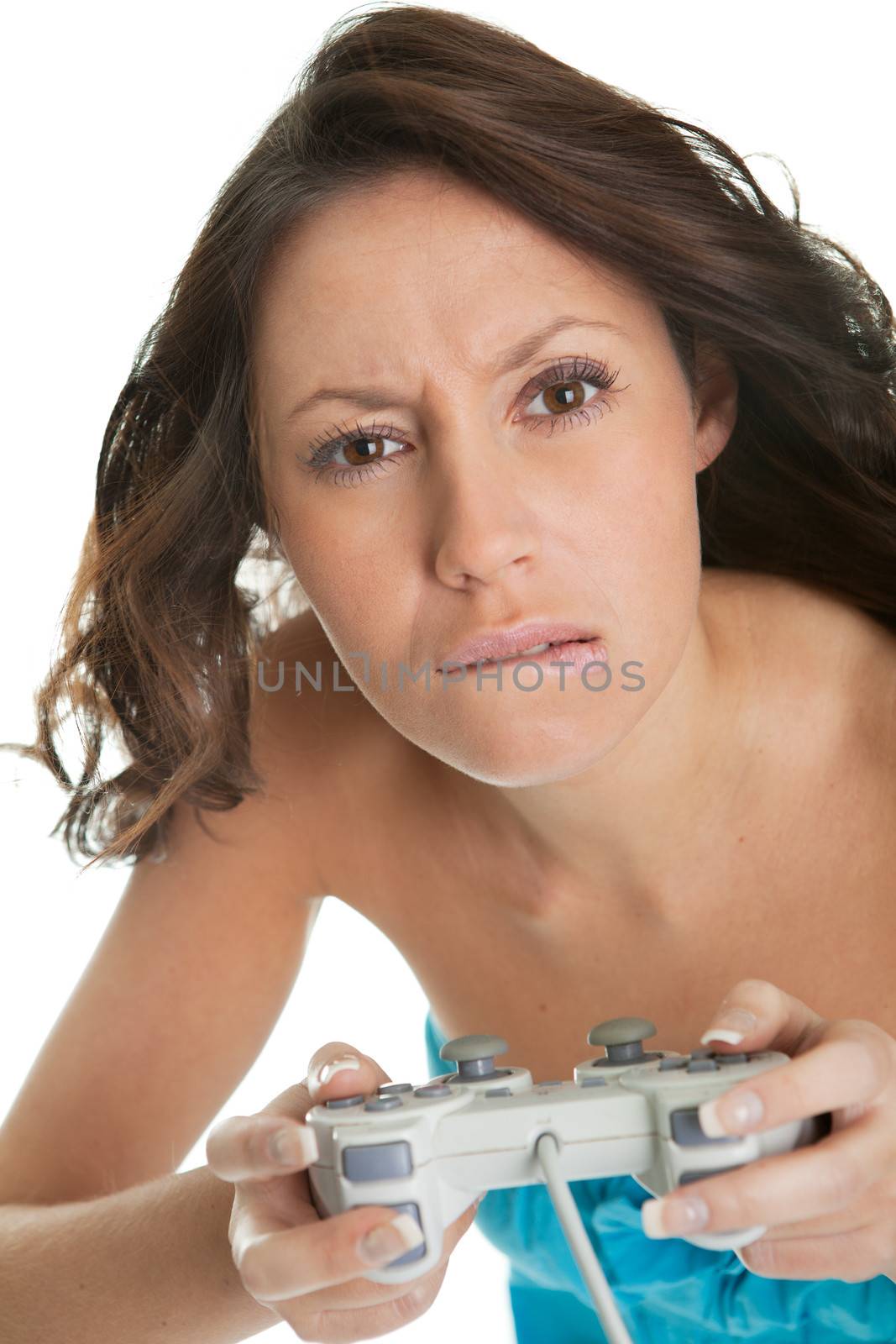 Young woman concentrated on videogame by AndreyPopov