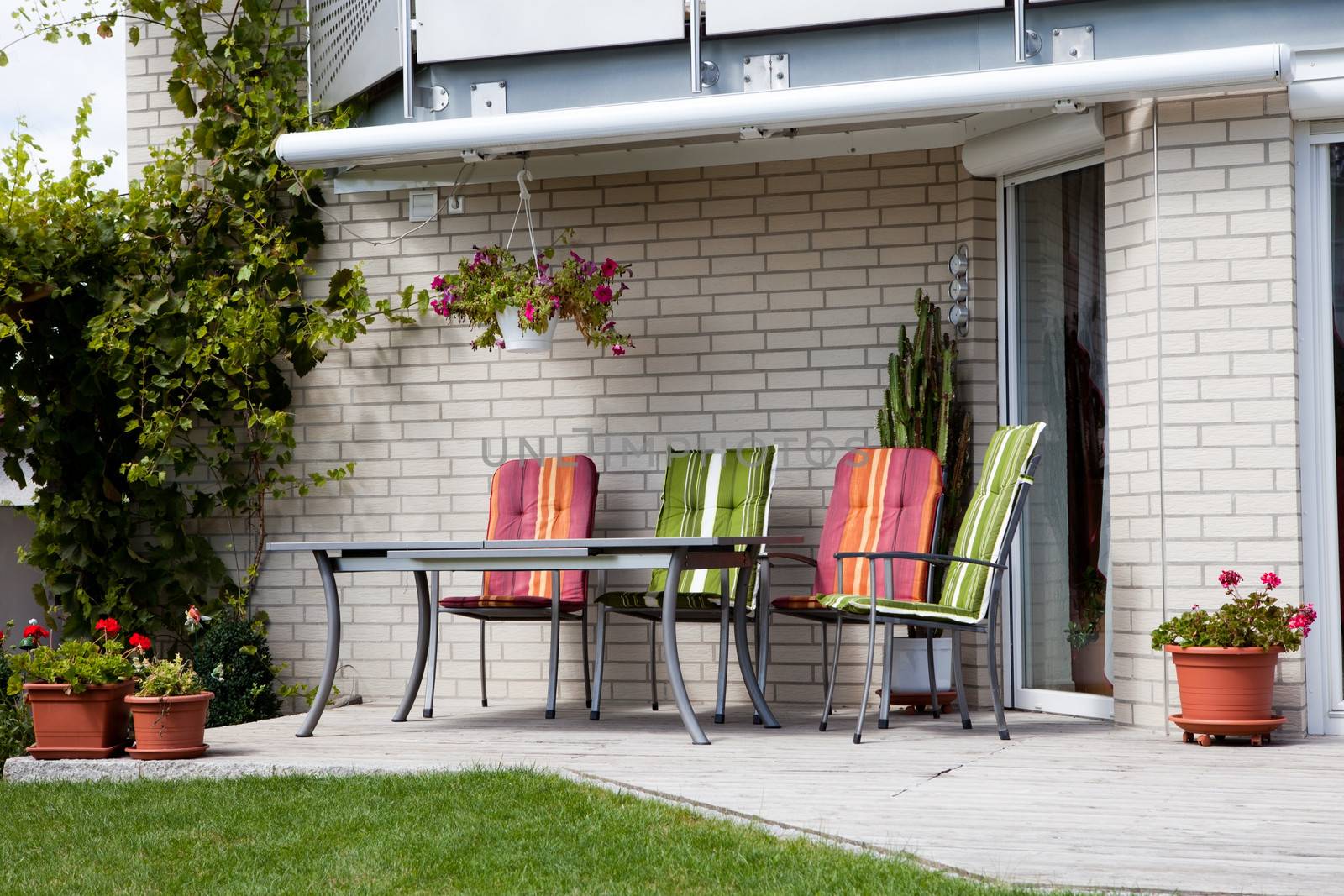 Image of sitting area in front yard of house