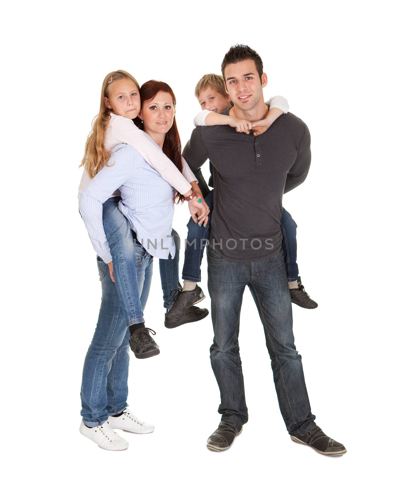 Happy young family spending time together. Isolated on white